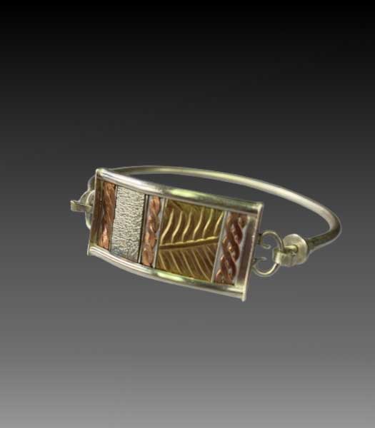 Photo of a bracelet for the Metalsmithing Channels & Panels Jewelry Making Classes